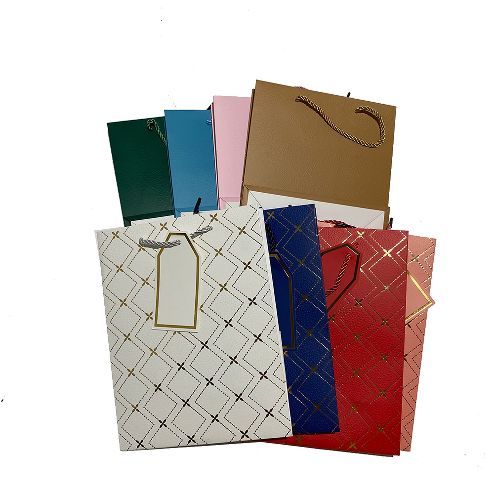Custom Luxury Matte Paper Bags with Gold Hot-Stamping and 3D Raised Embossing for High-End Boutique Packaging